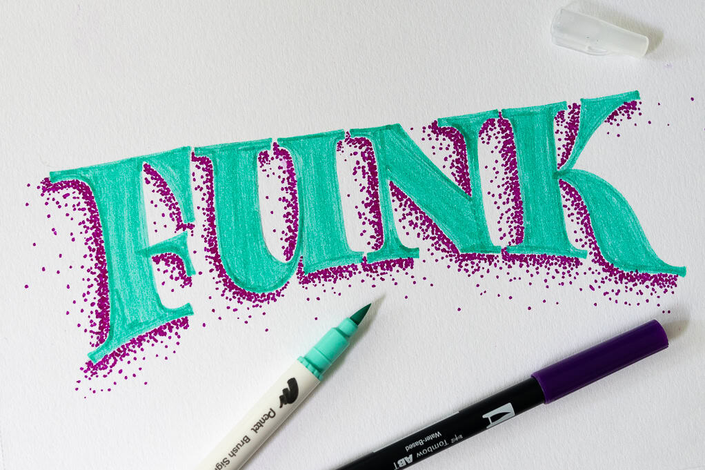 Colorful hand-lettered word 'FUNK' with markers.