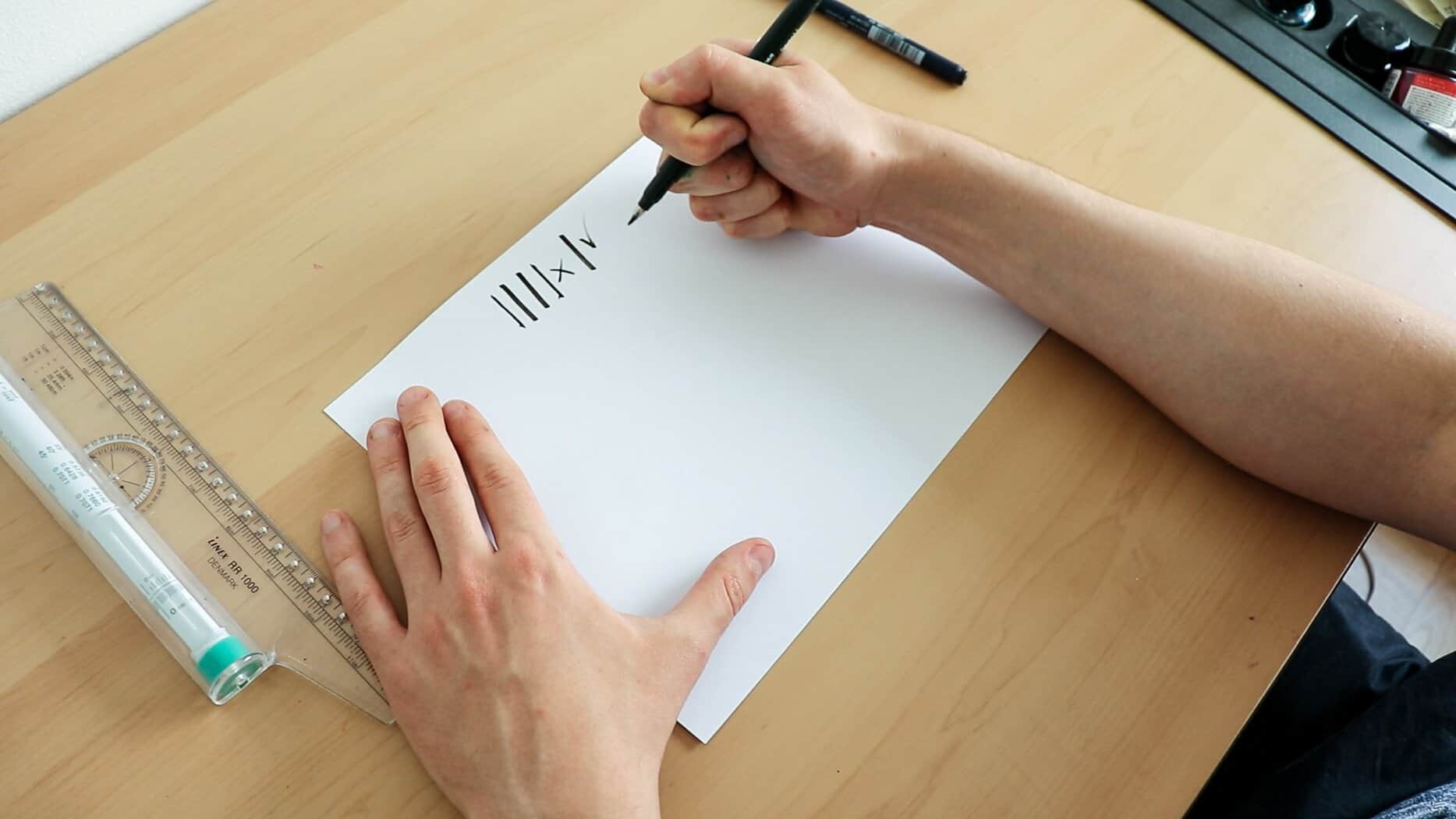 Holding the brush pen in a fist-like position