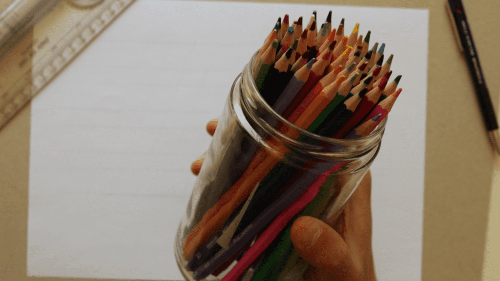 colored pencils in a jar. 