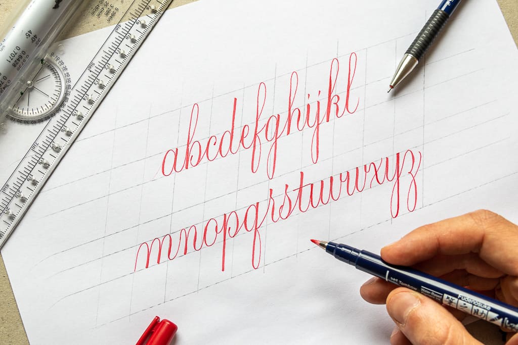 Lowercase calligraphy alphabet example.