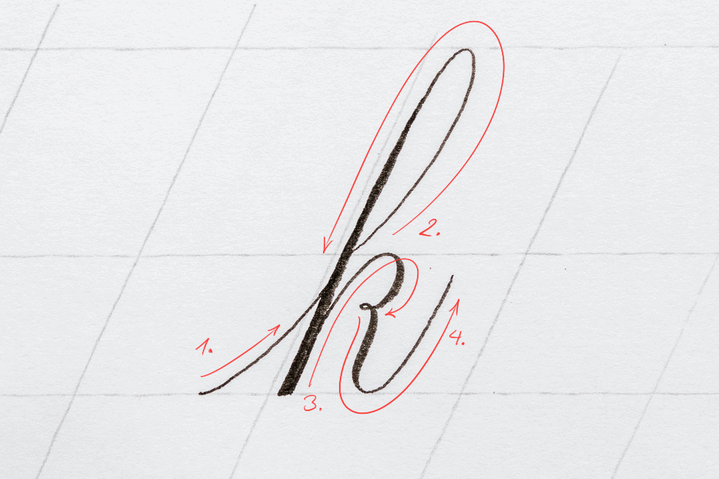 The letter k in calligraphy. 