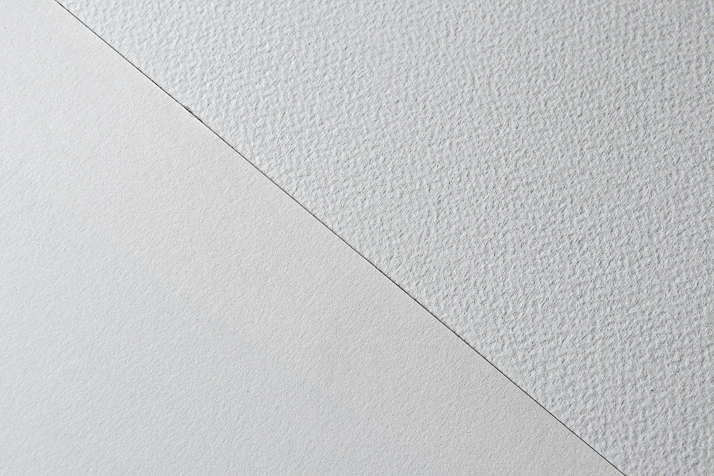 Comparison between cold press and hot press watercolor paper. 