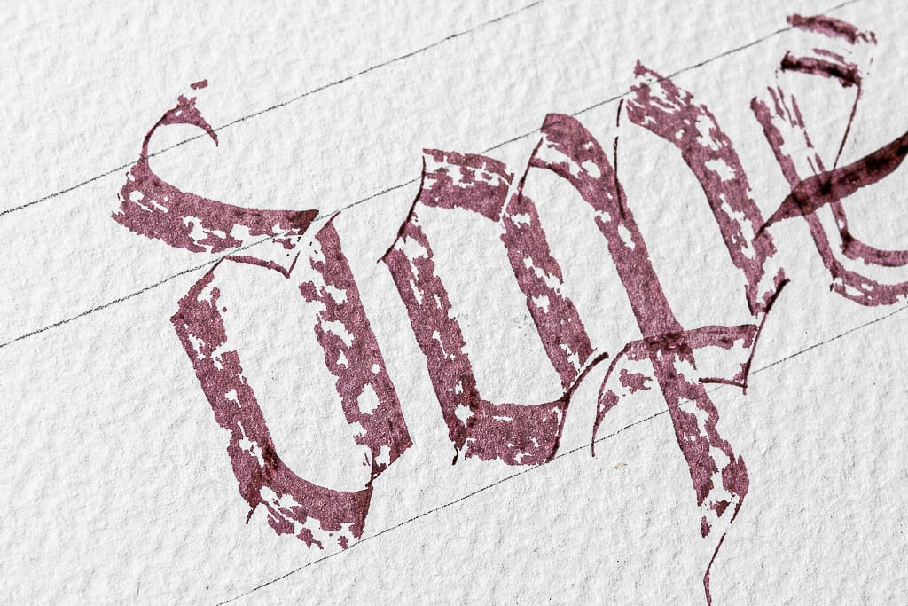 Calligraphy texture on watercolor paper. 