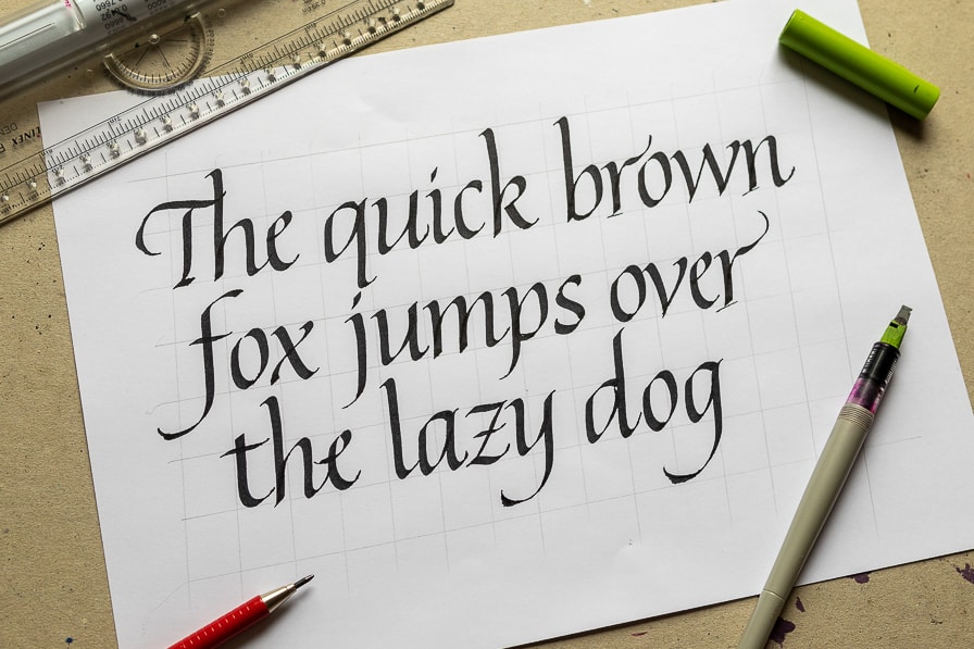 Italic calligraphy written in black ink on white paper. 