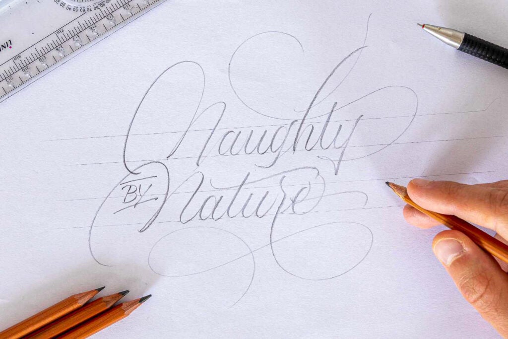 Handwriting practice with colored pencils and ruler