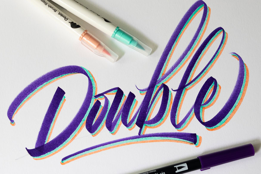 Hand-lettered word 'Double' with colorful markers